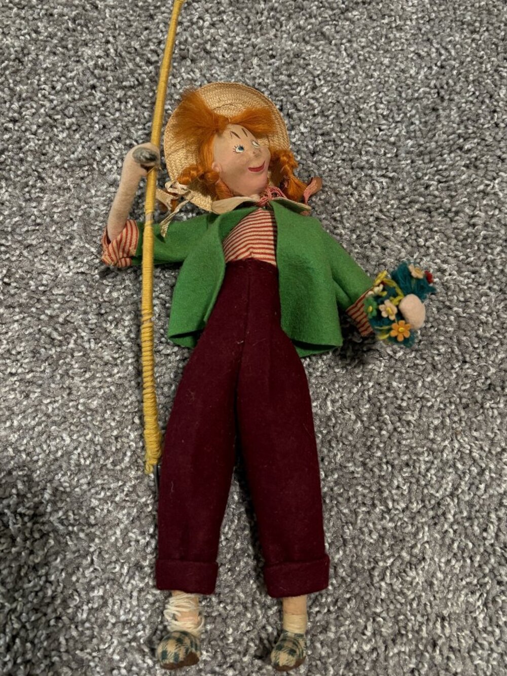 Vintage 1930's Klumpa doll. Visible wear.